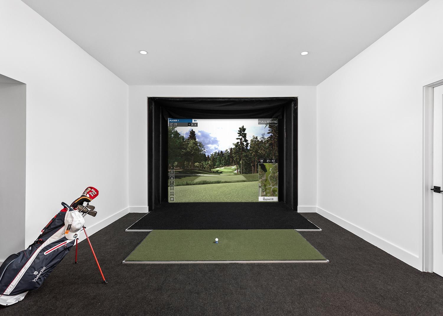 Golf Simulator in a white room