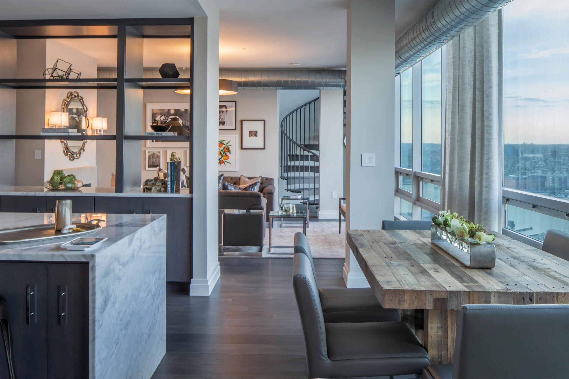 Kitchen and dining area with city views in a Baltimore Condo